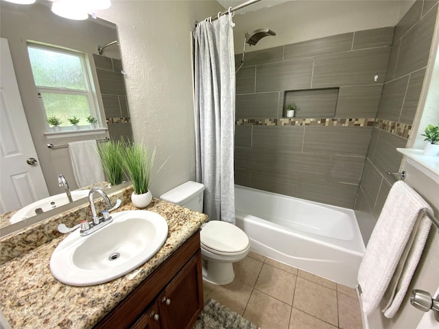 6509 Woodway Dr, Fort Worth, TX 76133 - full bath with vanity, shower / bath combo with shower curtain, tile patterned flooring, and a textured wall