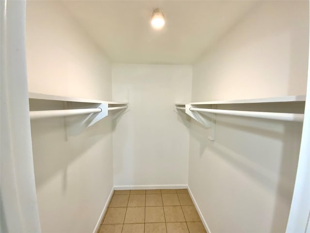 6509 Woodway Dr, Fort Worth, TX 76133 - walk in closet with light tile patterned flooring