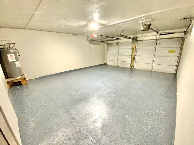 6509 Woodway Dr, Fort Worth, TX 76133 - garage featuring electric water heater and a garage door opener