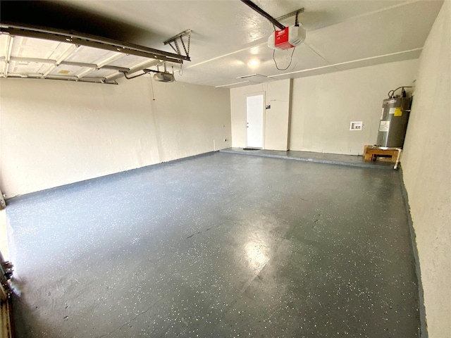 6509 Woodway Dr, Fort Worth, TX 76133 - garage featuring water heater and a garage door opener