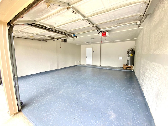 6509 Woodway Dr, Fort Worth, TX 76133 - garage with water heater and a garage door opener