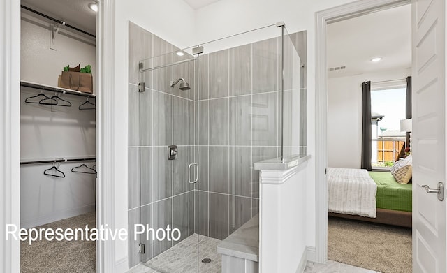 1805 Tree House Trl, Mesquite, TX 75181 - ensuite bathroom with a shower stall and a spacious closet
