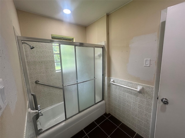 1726 Crescent Dr, Sherman, TX 75092 - full bath with enclosed tub / shower combo, tile patterned floors, tile walls, and a wainscoted wall