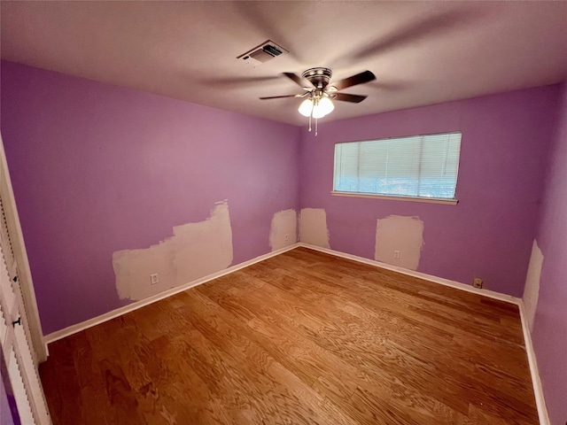 1726 Crescent Dr, Sherman, TX 75092 - empty room featuring wood finished floors and a ceiling fan