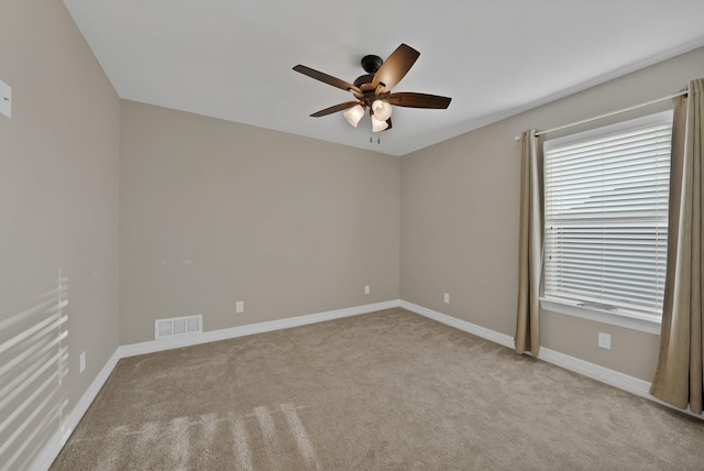 940 E 5th St, Springtown, TX 76082 - carpeted spare room featuring ceiling fan and baseboards