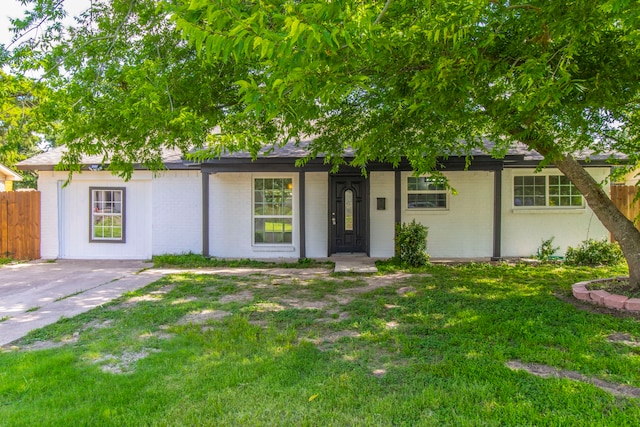 10029 Grove Oaks Blvd, Dallas, TX 75217 - view of front facade featuring brick siding