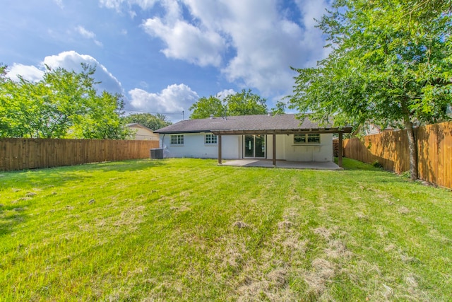 10029 Grove Oaks Blvd, Dallas, TX 75217 - back of property with a patio and a fenced backyard