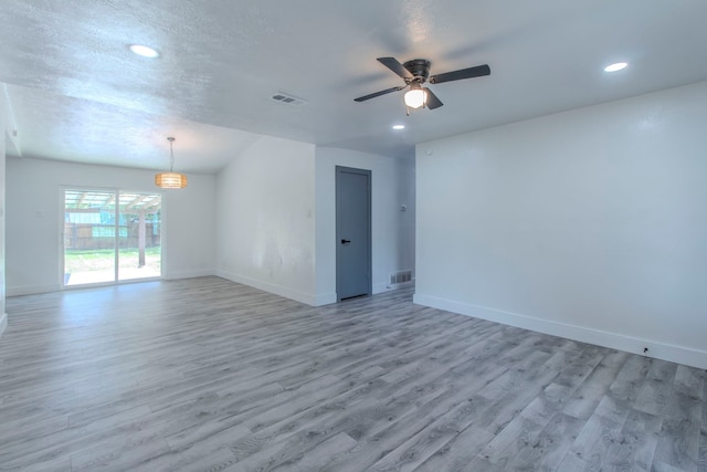 10029 Grove Oaks Blvd, Dallas, TX 75217 - unfurnished room with light wood-style floors, ceiling fan, and recessed lighting