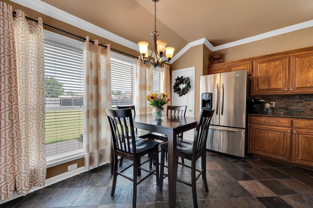 701 Champlain Ct, Midlothian, TX 76065 - dining room featuring vaulted ceiling, a chandelier, ornamental molding, and stone tile floors