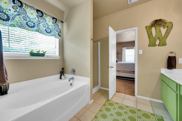 701 Champlain Ct, Midlothian, TX 76065 - full bath featuring a garden tub, vanity, tile patterned floors, a stall shower, and ensuite bathroom