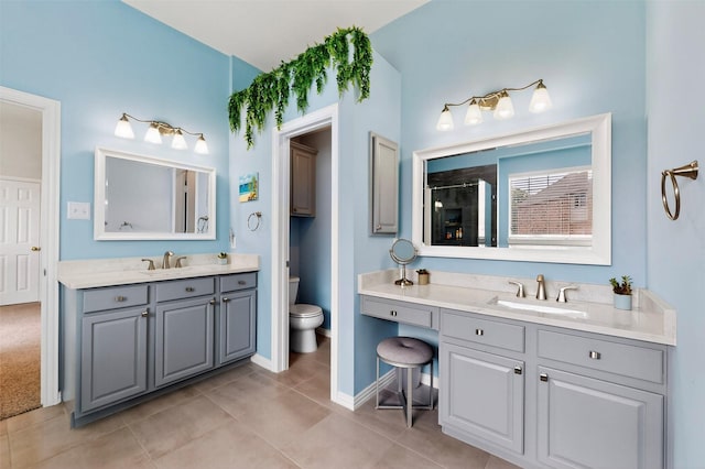 236 Hope Cir, Murphy, TX 75094 - full bathroom with two vanities, a shower stall, and tile patterned flooring