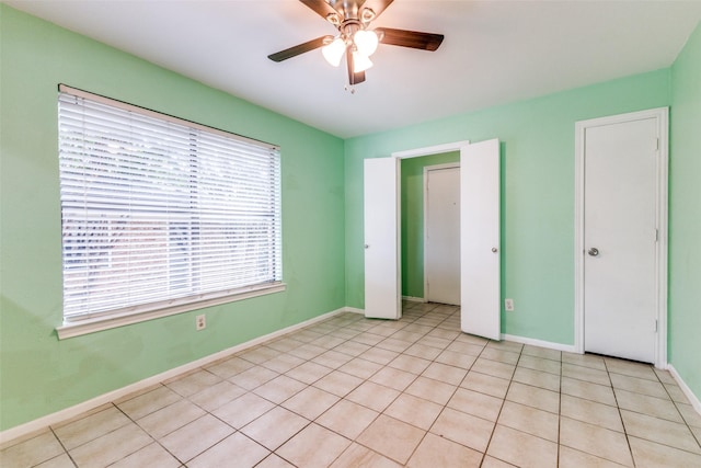 1308 Choctaw Dr, Mesquite, TX 75149 - unfurnished bedroom with light tile patterned floors and ceiling fan
