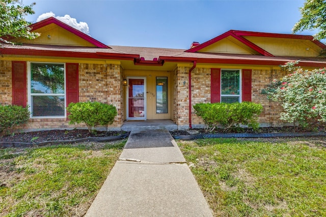 1308 Choctaw Dr, Mesquite, TX 75149 - ranch-style home featuring brick siding and a front lawn