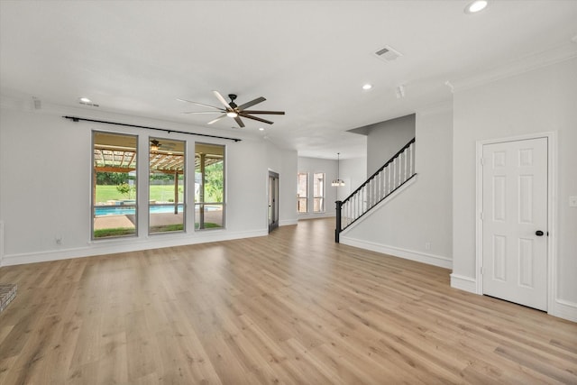6417 Gehrig Cir, Burleson, TX 76028 - unfurnished living room featuring recessed lighting, ornamental molding, ceiling fan, light wood-style floors, and stairs