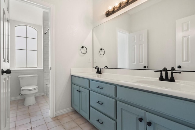 6417 Gehrig Cir, Burleson, TX 76028 - full bathroom with double vanity, tile patterned floors, and shower / bathtub combination