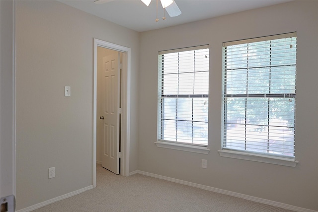 5757 E University Blvd Unit 22F, Dallas, TX 75206 - unfurnished room featuring a ceiling fan and light colored carpet