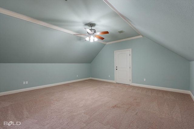 1030 Winterberry Ln, Shreveport, LA 71106 - additional living space with light colored carpet, vaulted ceiling, and a ceiling fan