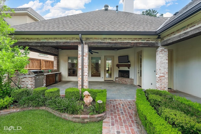 1030 Winterberry Ln, Shreveport, LA 71106 - view of patio featuring ceiling fan and an outdoor kitchen