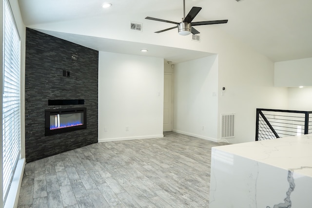 624 Mission Hills Dr, Arlington, TX 76018 - unfurnished living room featuring light wood-style floors, ceiling fan, a large fireplace, high vaulted ceiling, and recessed lighting