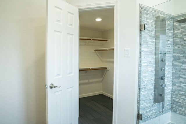 624 Mission Hills Dr, Arlington, TX 76018 - spacious closet featuring wood finished floors
