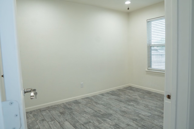 624 Mission Hills Dr, Arlington, TX 76018 - empty room featuring healthy amount of natural light and light wood finished floors