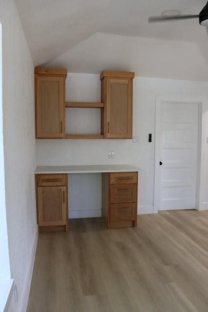 129 Oak Trl, Burleson, TX 76028 - unfurnished office featuring light wood finished floors, vaulted ceiling, and built in study area