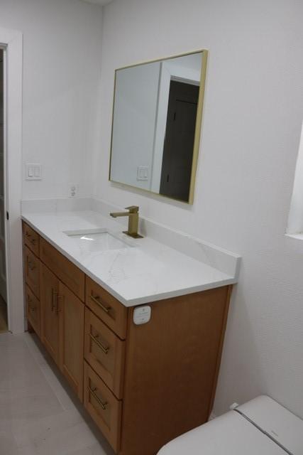 129 Oak Trl, Burleson, TX 76028 - bathroom featuring vanity and toilet