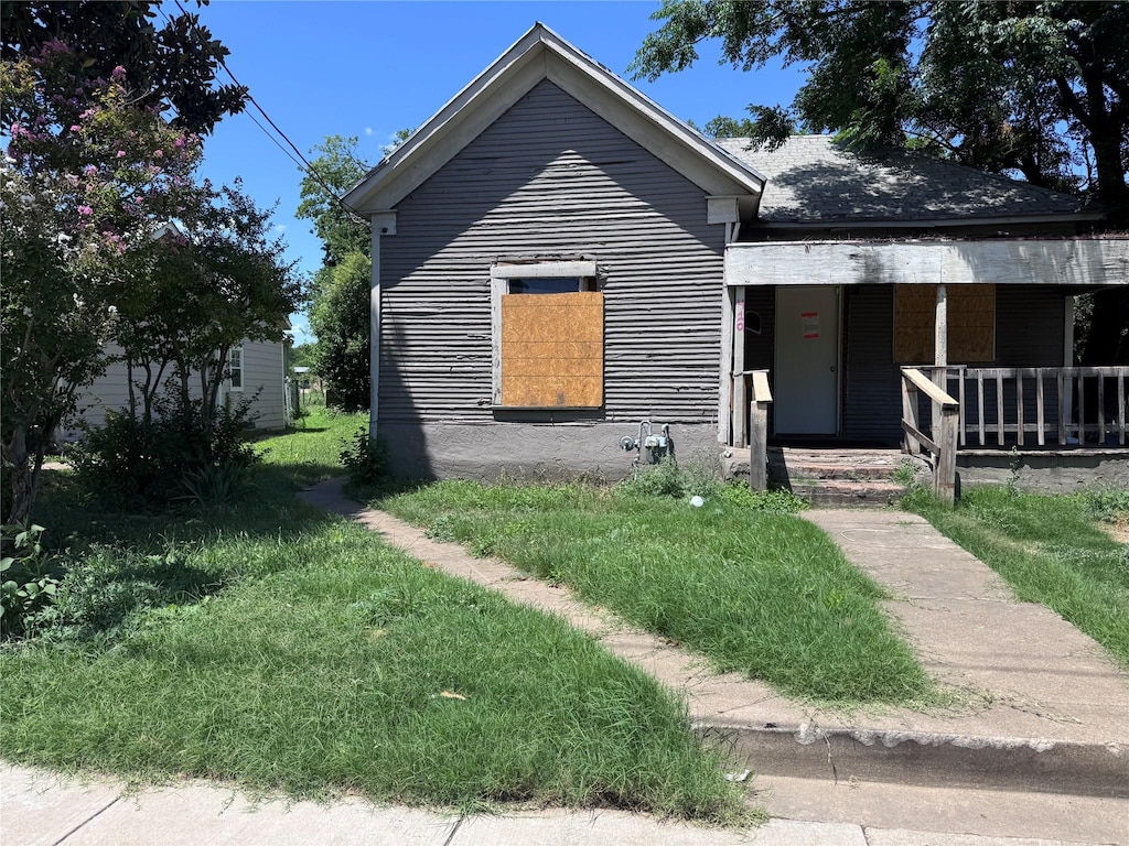 410 Cliff St, Fort Worth, TX 76164 - view of front facade with covered porch
