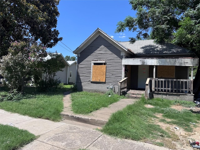 410 Cliff St, Fort Worth, TX 76164 - view of front facade with a porch