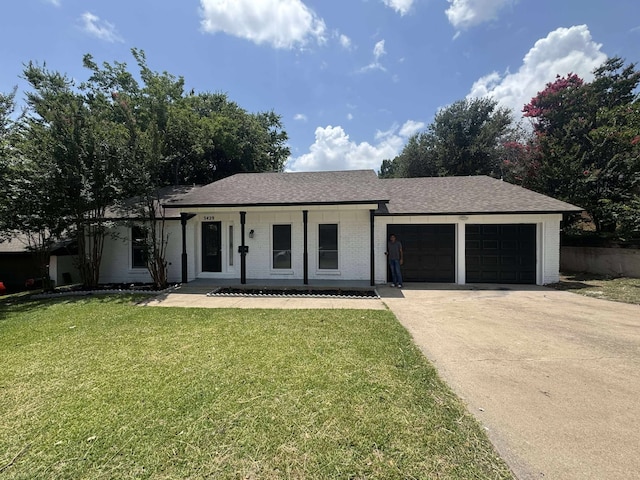 3429 Willowcrest Dr, North Richland Hills, TX 76117 - single story home with an attached garage, a front lawn, driveway, brick siding, and roof with shingles