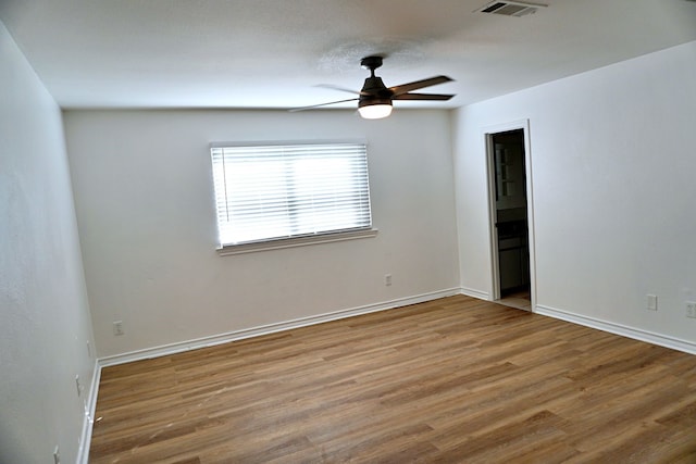 3429 Willowcrest Dr, North Richland Hills, TX 76117 - spare room featuring wood finished floors and a ceiling fan