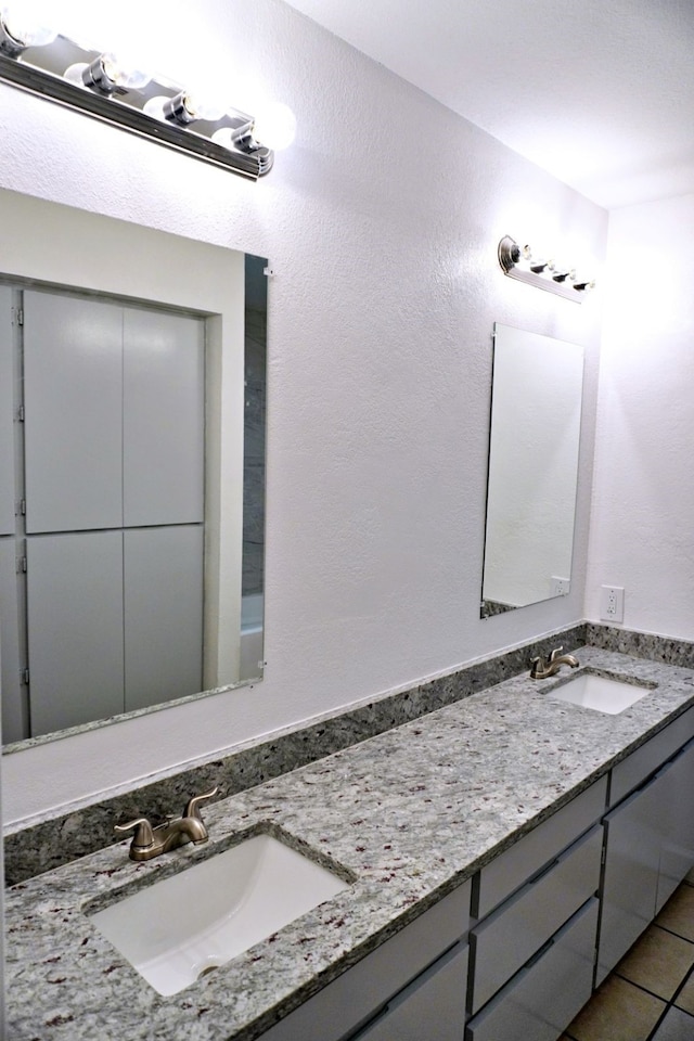 3429 Willowcrest Dr, North Richland Hills, TX 76117 - full bath featuring double vanity and tile patterned flooring