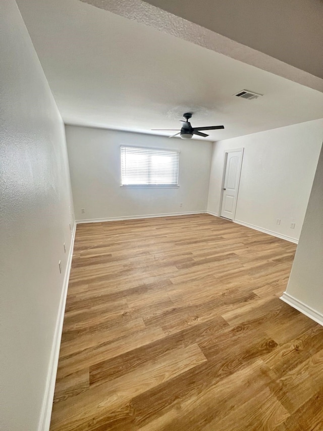 3429 Willowcrest Dr, North Richland Hills, TX 76117 - spare room with light wood finished floors and a ceiling fan