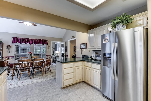120 Driftwood Ln, Waxahachie, TX 75165 - kitchen featuring stainless steel fridge, a peninsula, ceiling fan, lofted ceiling, and light tile patterned floors