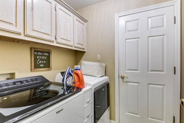 120 Driftwood Ln, Waxahachie, TX 75165 - laundry area with washing machine and dryer and cabinet space
