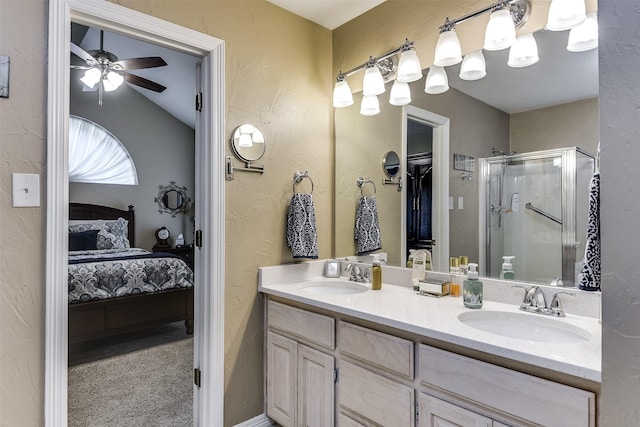 120 Driftwood Ln, Waxahachie, TX 75165 - full bath with ensuite bath, a stall shower, double vanity, ceiling fan, and a textured wall