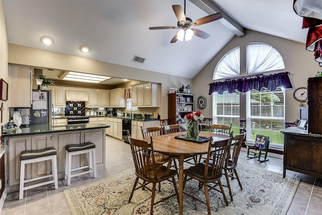 120 Driftwood Ln, Waxahachie, TX 75165 - dining space featuring a ceiling fan, beamed ceiling, light tile patterned floors, and high vaulted ceiling