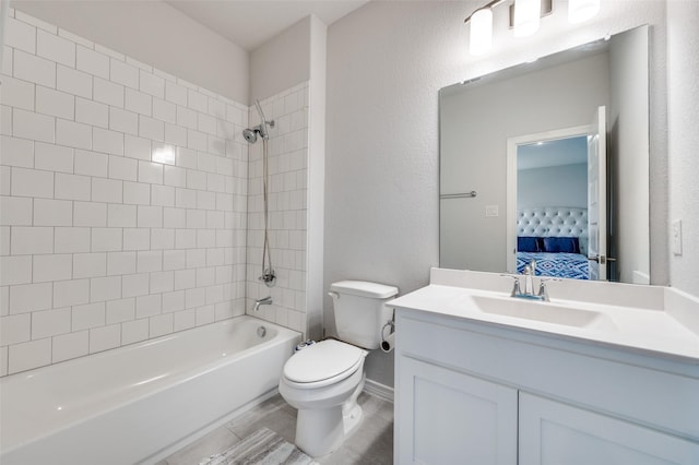 333 Foxthorne Way, Little Elm, TX 75068 - ensuite bathroom featuring vanity,  shower combination, a textured wall, and tile patterned floors