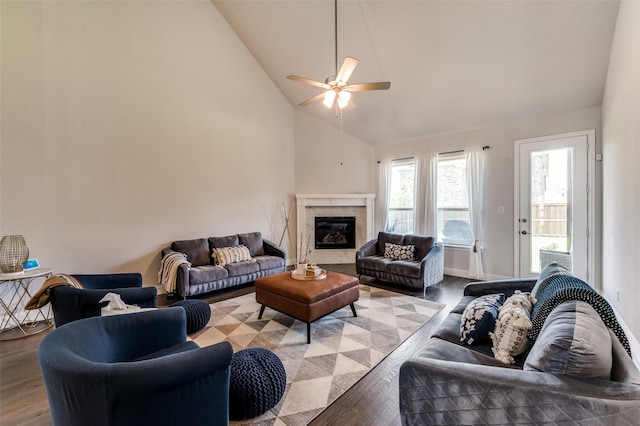 333 Foxthorne Way, Little Elm, TX 75068 - living room with wood finished floors, a premium fireplace, a ceiling fan, and high vaulted ceiling