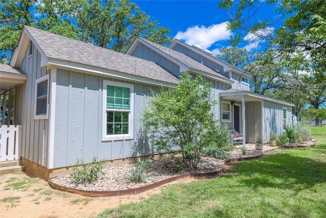 3125 County Road 264, Breckenridge, TX 76424 - view of property exterior featuring a yard, board and batten siding, and roof with shingles