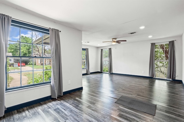 1212 E Mulkey St, Fort Worth, TX 76104 - spare room with a ceiling fan, recessed lighting, and wood finished floors