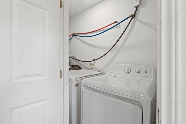 1212 E Mulkey St, Fort Worth, TX 76104 - laundry room with washer and clothes dryer