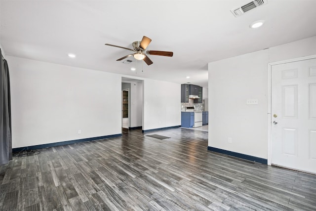 1212 E Mulkey St, Fort Worth, TX 76104 - unfurnished living room with ceiling fan, dark wood finished floors, and recessed lighting