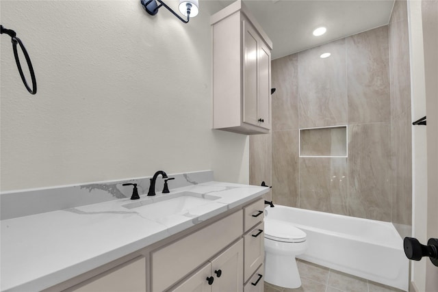 1604 Franklin St, Weatherford, TX 76086 - bathroom with vanity, shower / bath combination, tile patterned flooring, and recessed lighting