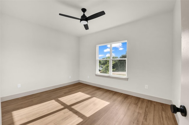 1604 Franklin St, Weatherford, TX 76086 - empty room with wood finished floors and ceiling fan