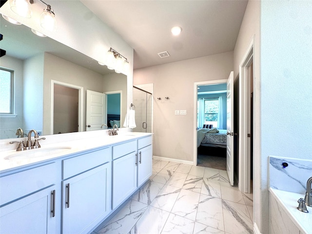 7204 Silent Mill Rd, Arlington, TX 76001 - ensuite bathroom featuring a shower stall, double vanity, marble finish floors, a tub to relax in, and recessed lighting