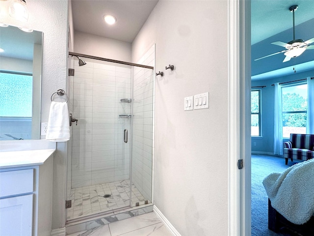 7204 Silent Mill Rd, Arlington, TX 76001 - full bathroom featuring a stall shower, marble look tile flooring, vanity, ceiling fan, and ensuite bathroom