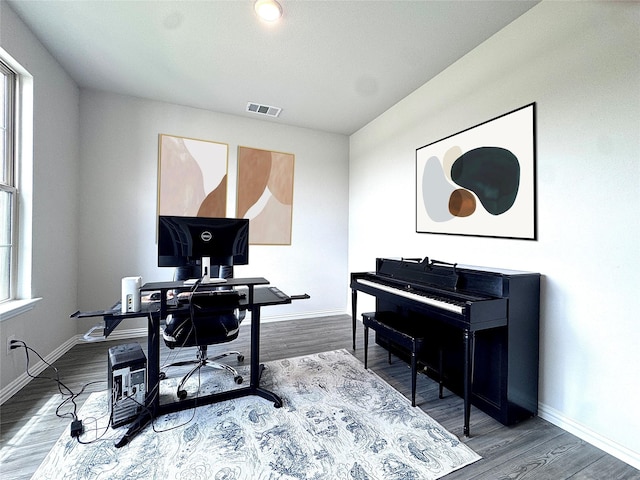 7204 Silent Mill Rd, Arlington, TX 76001 - home office with baseboards and wood finished floors