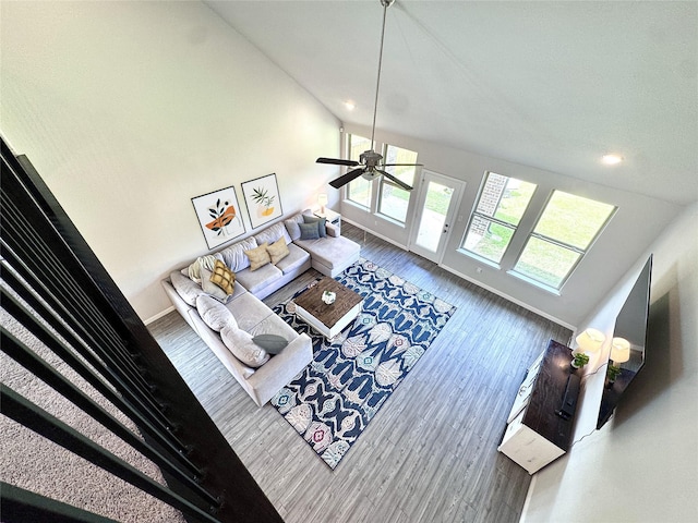 7204 Silent Mill Rd, Arlington, TX 76001 - living room with vaulted ceiling, ceiling fan, recessed lighting, and wood finished floors