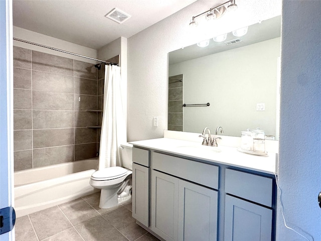 7204 Silent Mill Rd, Arlington, TX 76001 - full bath with tile patterned floors, a textured wall, vanity, and shower / bath combo with shower curtain